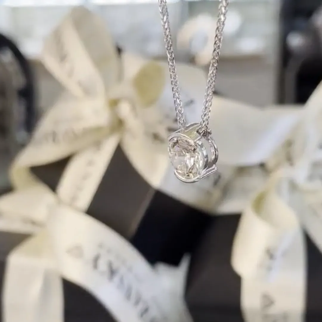 /public/photos/live/Round Moissanite Half Bezel Set Floating Pendant  628 (1).webp